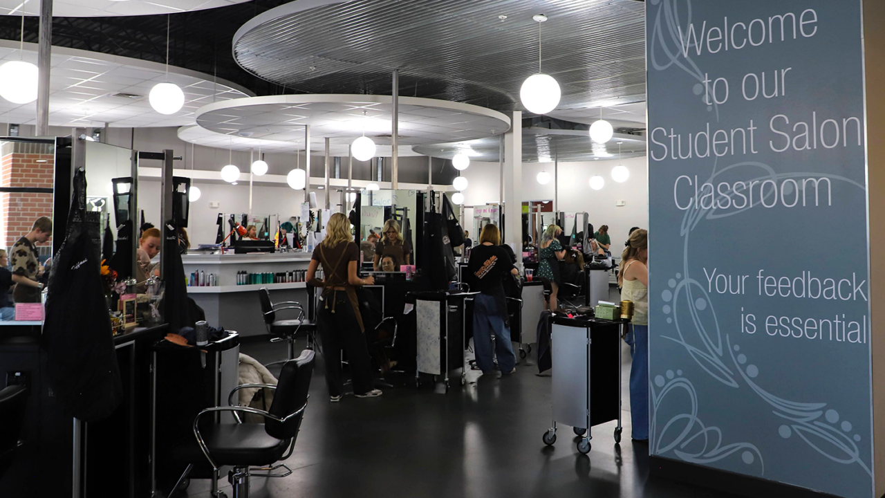 Oliver Finley Academy salon floor with students